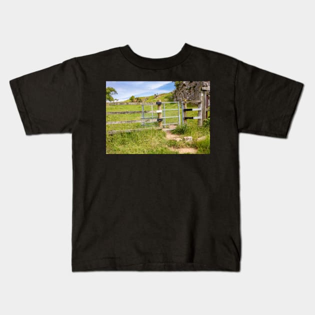 Welsh Coastal Path, Gower, South Wales. One of the many metal gates to fence in livestock grazing along the coastal path Kids T-Shirt by yackers1